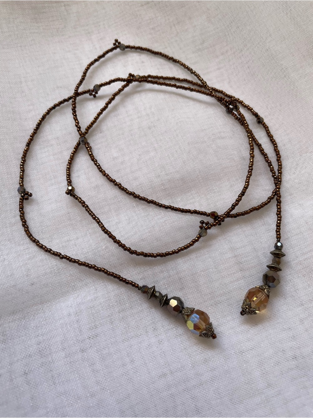 Stunning Bronze Iridescent Beaded Lariat Necklace Faceted Crystal Drops